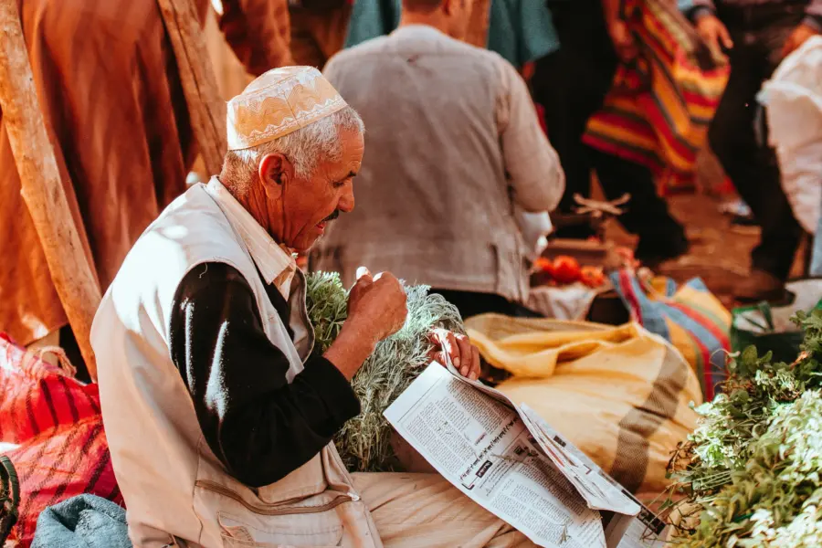 Avila Reizen Marokko Marrakech man op markt