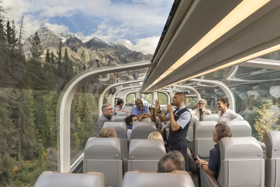 Photo credit Rocky Mountaineer Onboard Gold Leaf Service Host