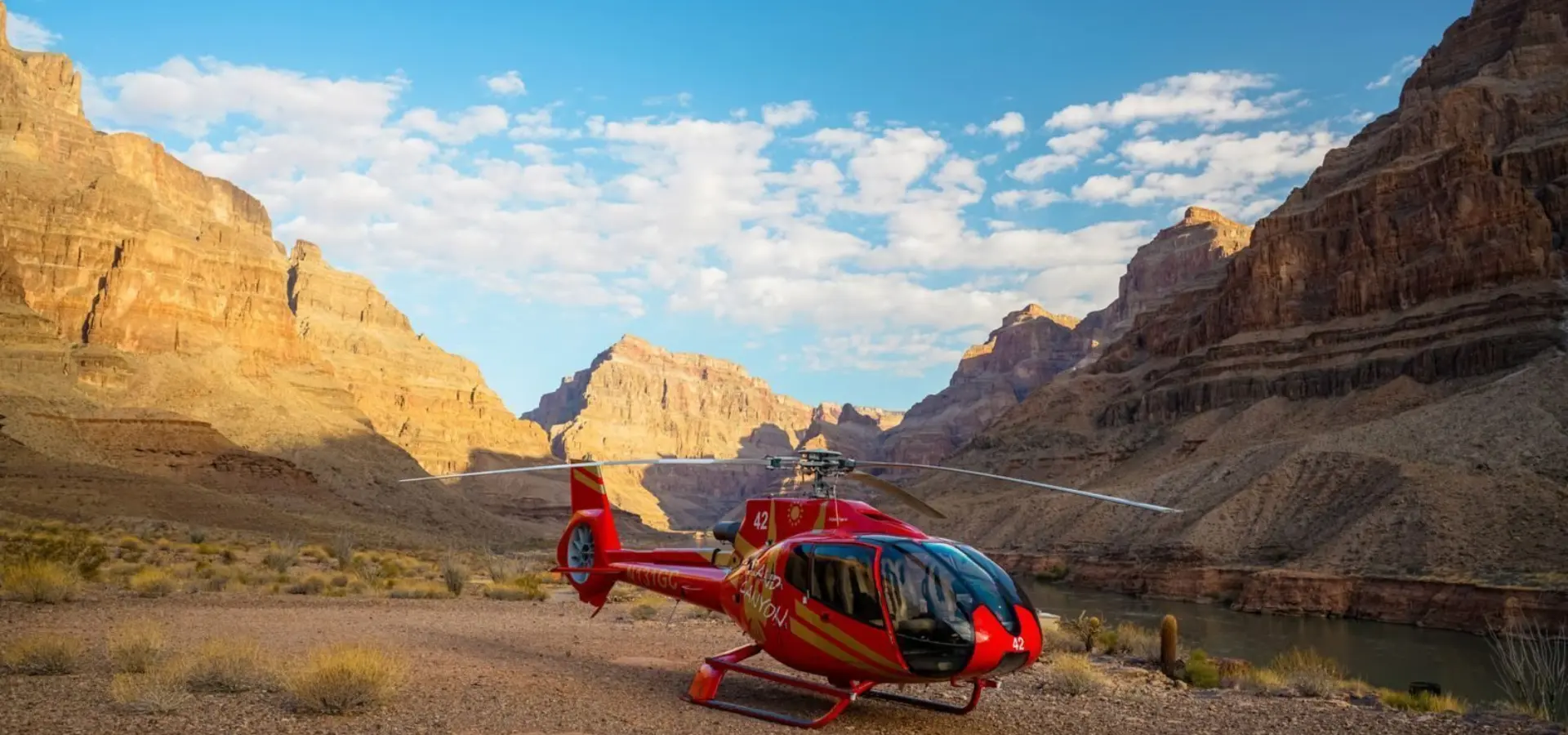 Rs14871 dsc02767 lpr red ec 130 landed bottom of grand canyon west early morning blue skys