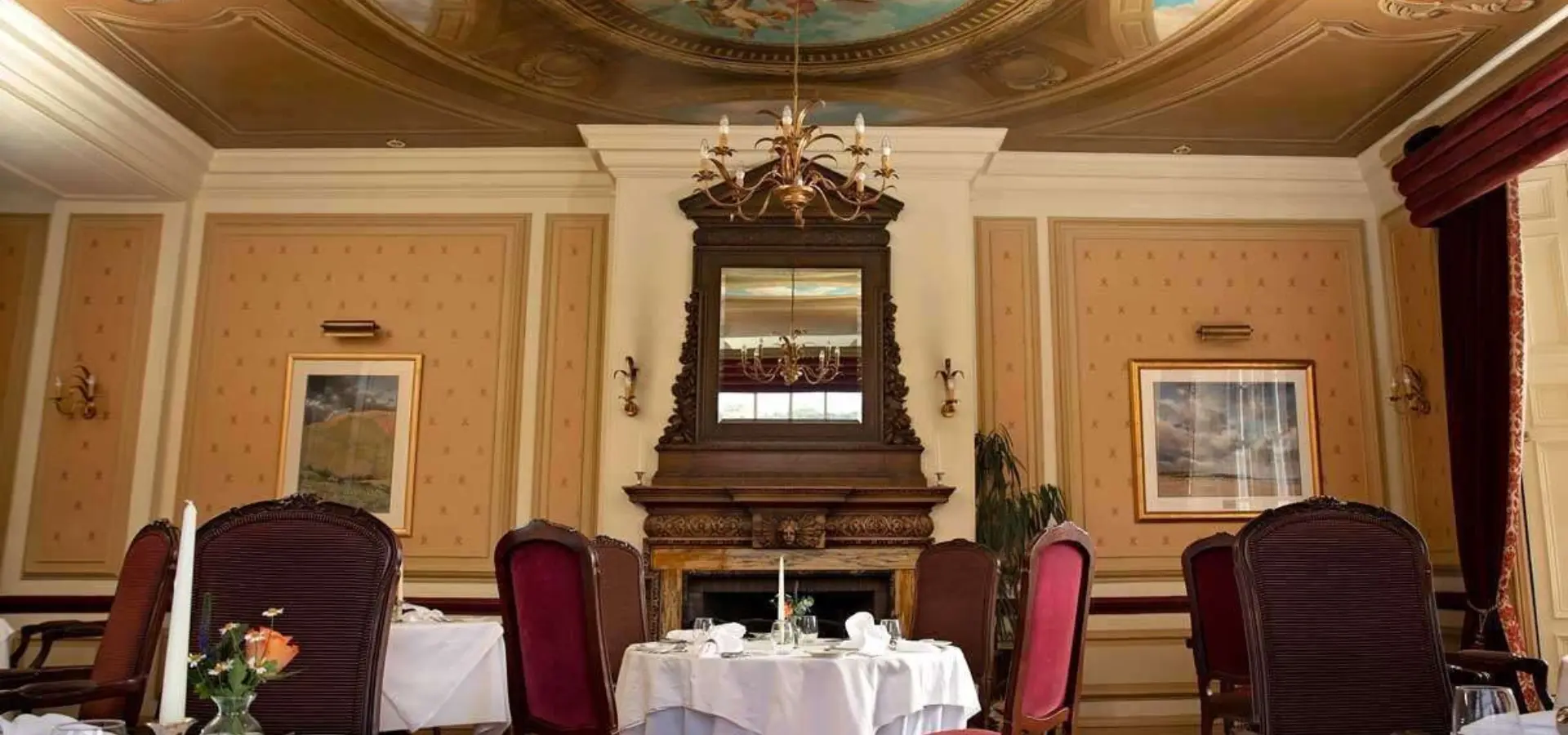 Cringletie sutherland restaurant dining room with ornate painted ceiling