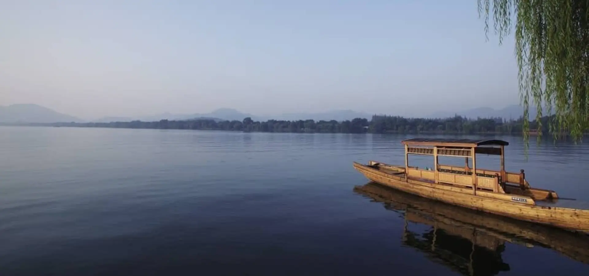 Hangzhou west lake boat 1600x900