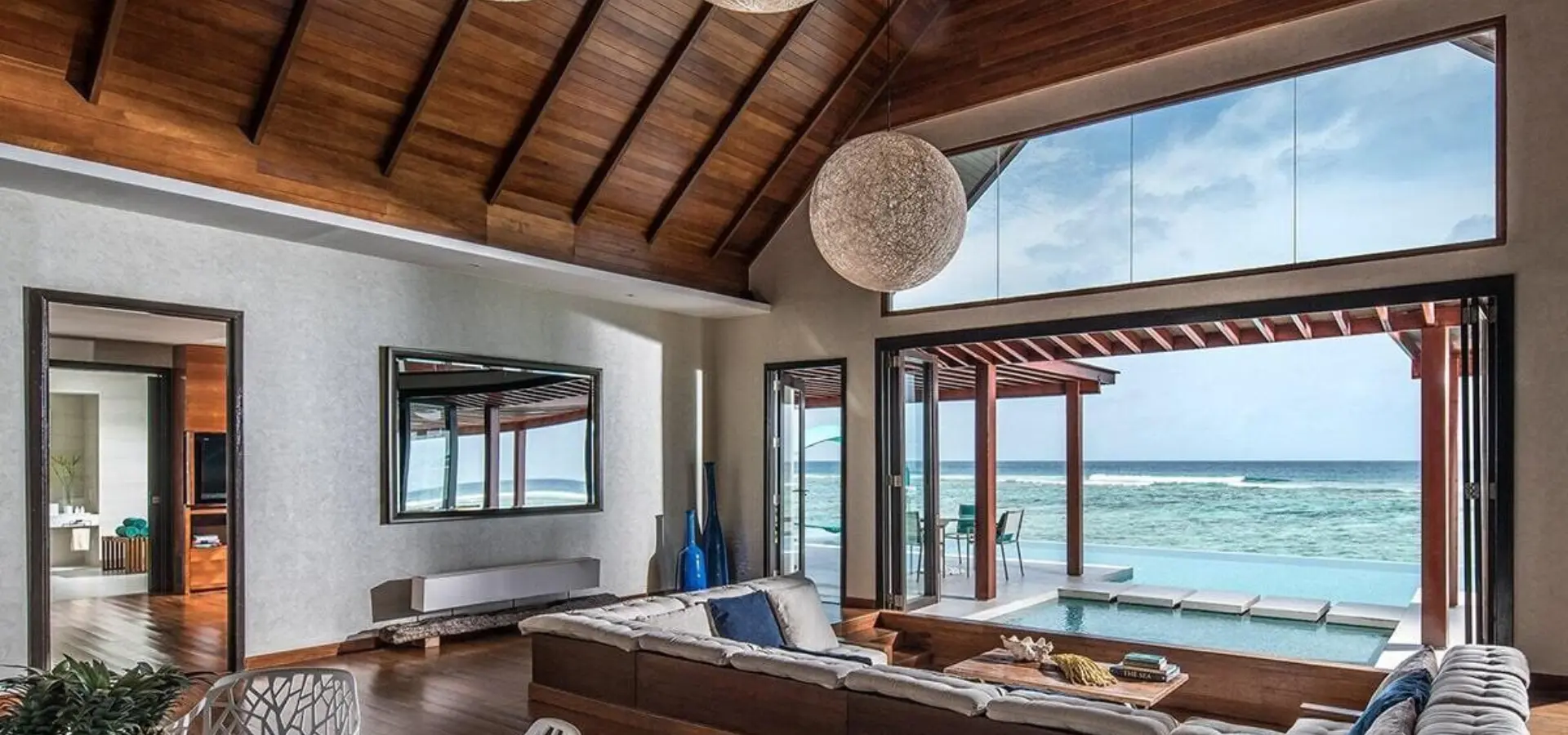 Pniy two bedroom ocean pool pavilion living room 02 g a l 1200x900