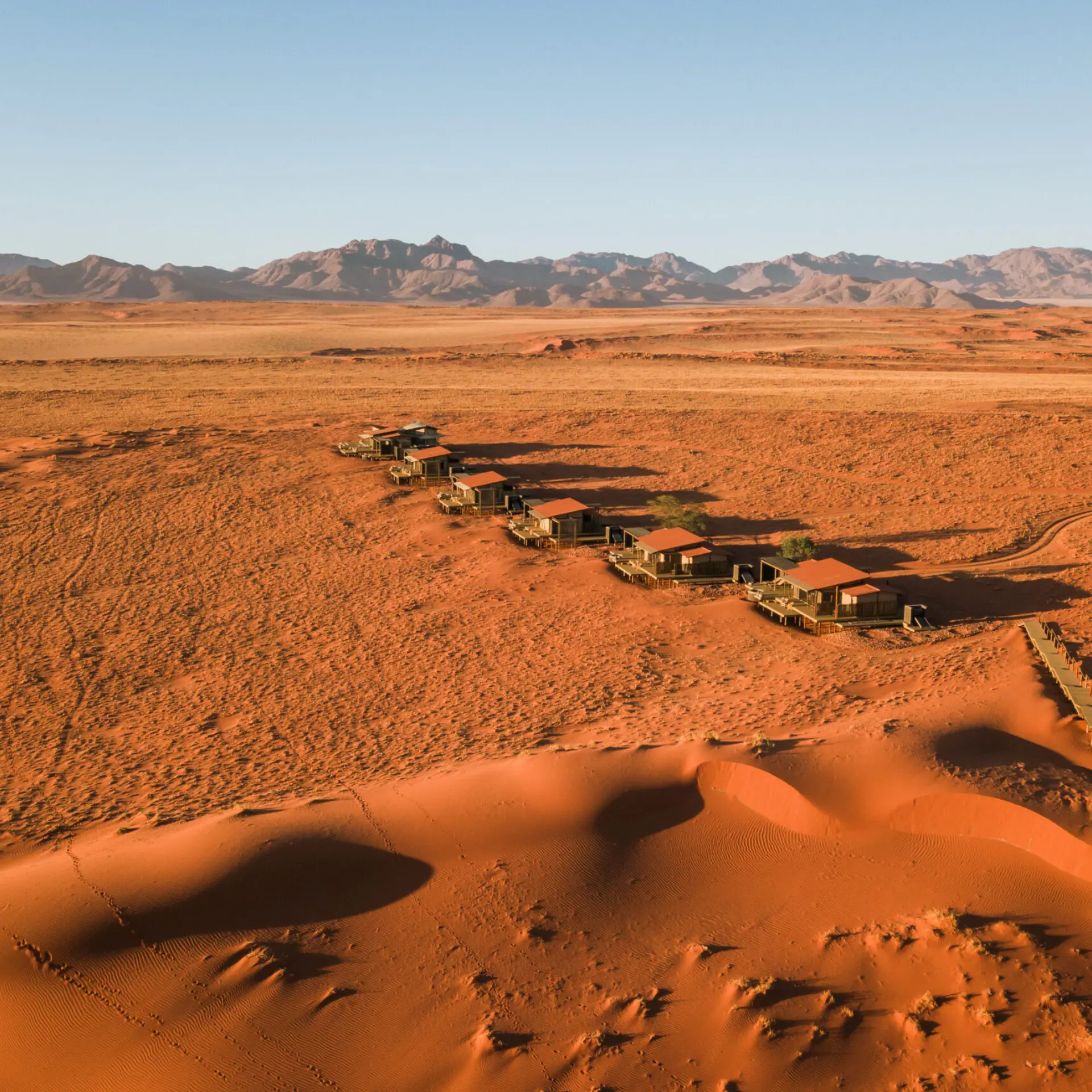 WOLWEDANS COLLECTION Desert Lodge Aerials Blending into orange sands 2 scaled
