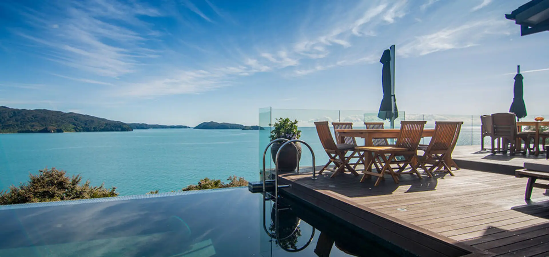 Luxury accommodation new zealand split apple retreat infinity pool and terrace