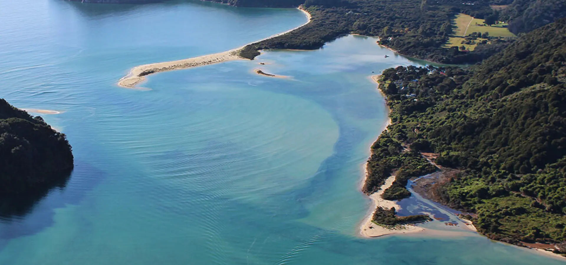 Luxury accommodation new zealand split apple retreat abel tasman experiences helicopter tour