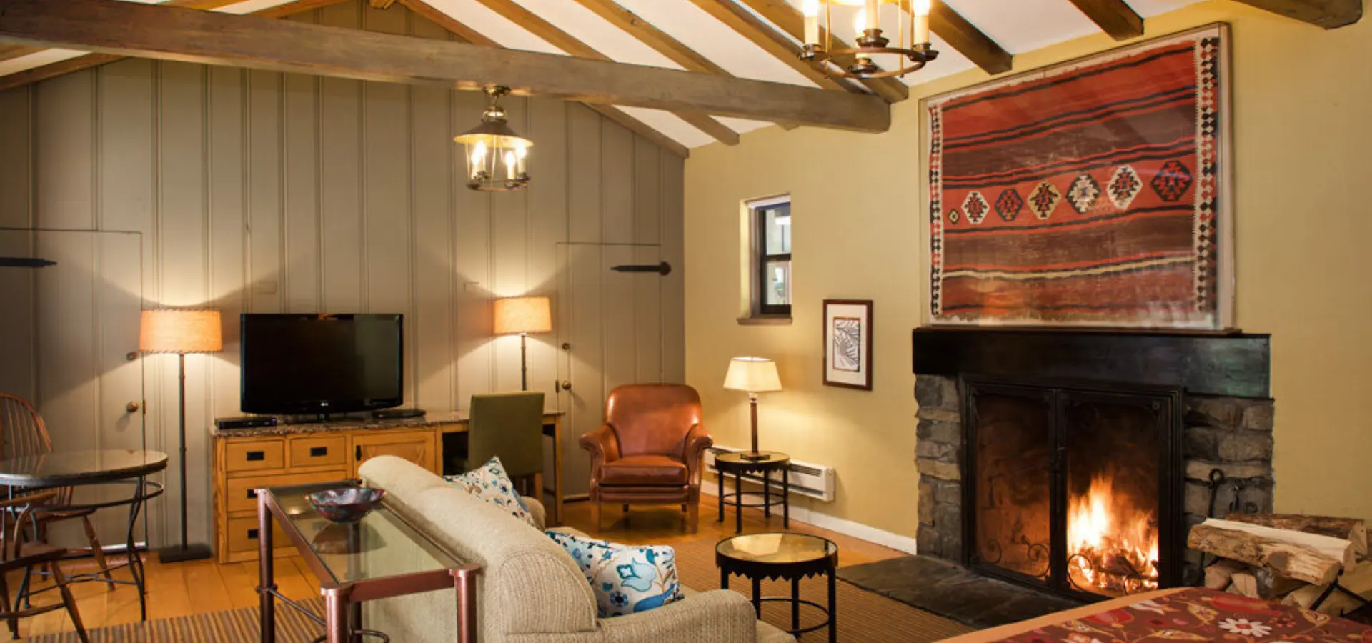 1733926924146 featured cottage with a king bed and a fireplace 1000x667