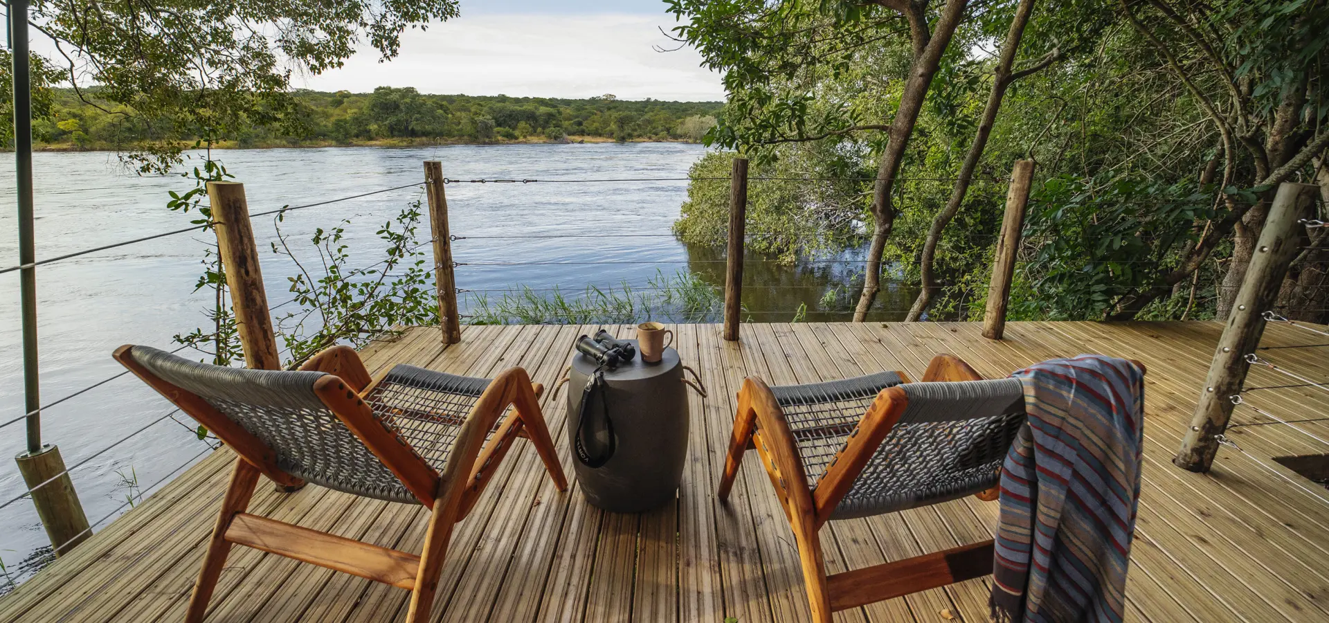 Tsowa river deck safari tent view