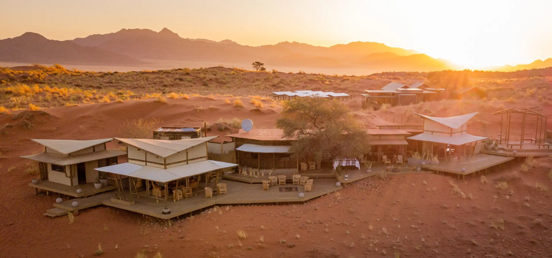 1736924264106 WOLWEDANS COLLECTION Dune Camp Main area at sunset